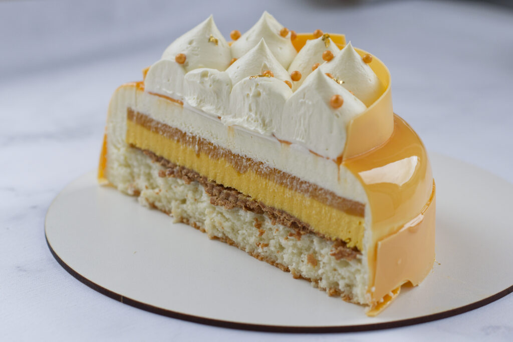 Tropical Coconut, Mango & Passionfruit Entremet section view