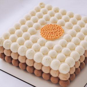 Triple chocolate mousse cake angle view