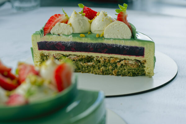 Pistachio & Raspberry Entremet artistic view